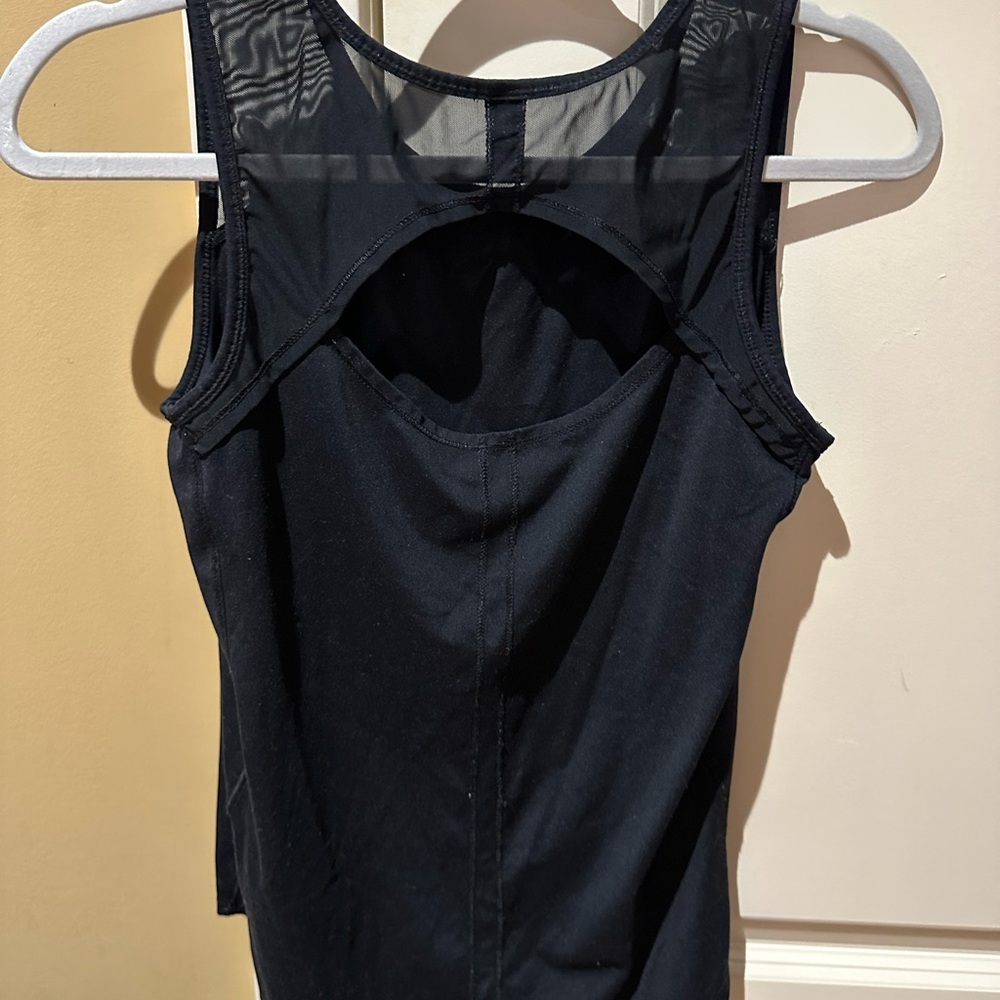 90 Degree black workout tank with open back and mesh accent. Size small